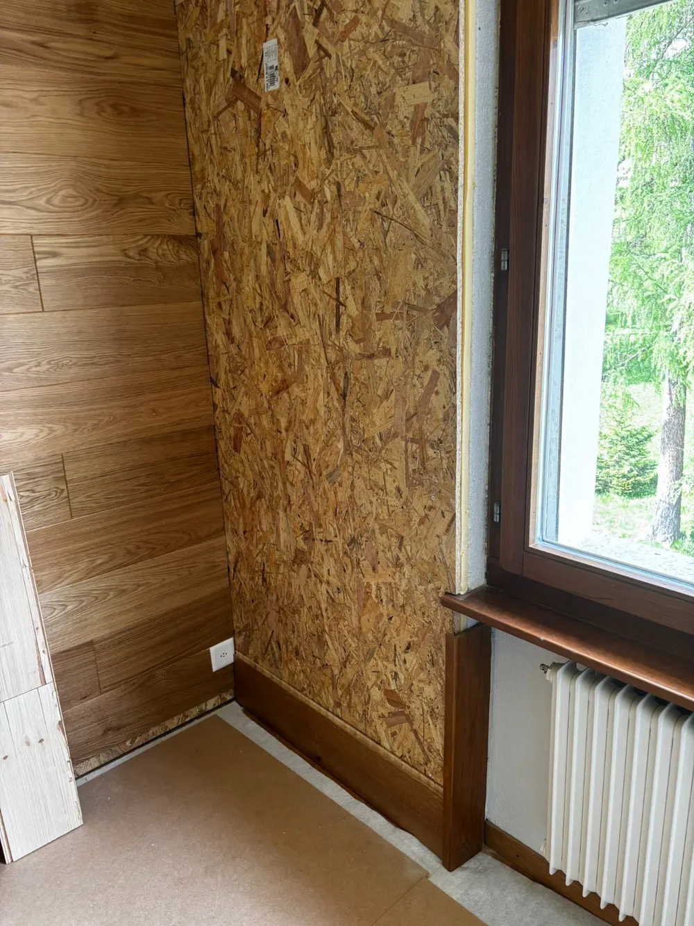 Paroi en lames de parquet et isolation – photo 3